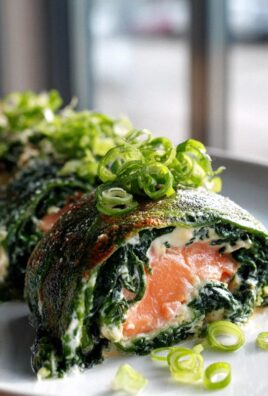 Spinat-Lachs-Rolle mit Spiegelei